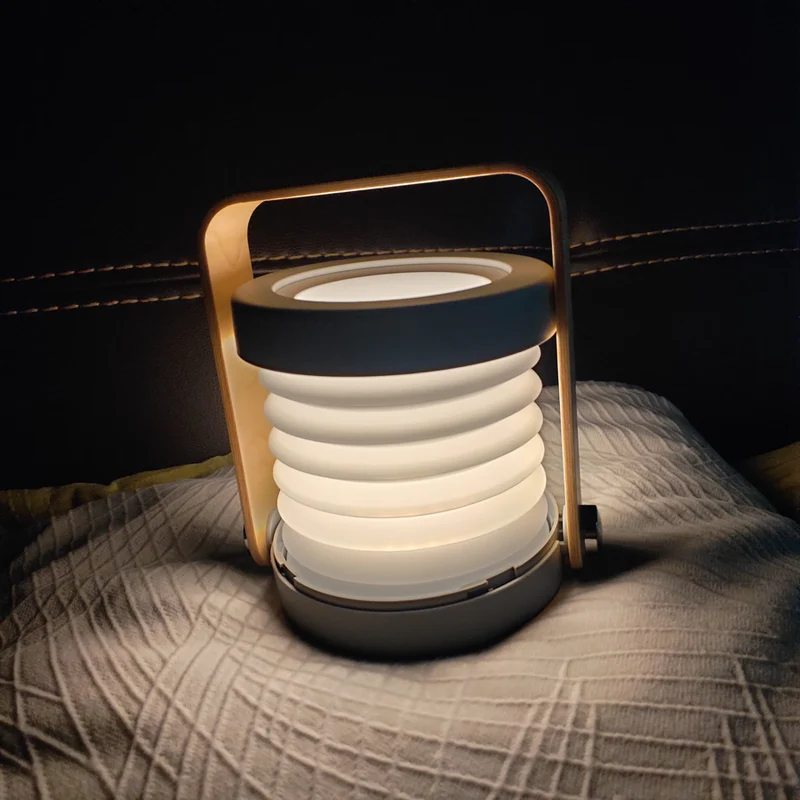 Laterne warmweiss, Spot- oder Ambientemodus, mit Akku, 3 Helligkeitsstufen und USB Ladegerät